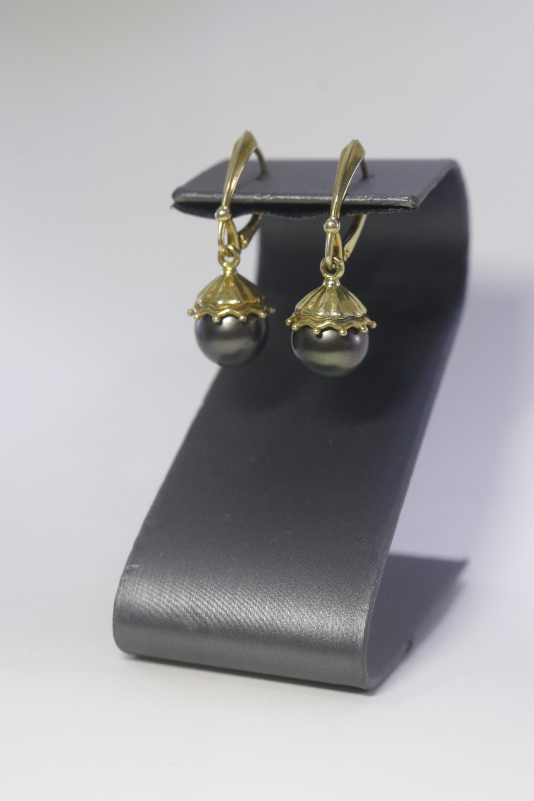 gold plated earrings with black tahitian pearls