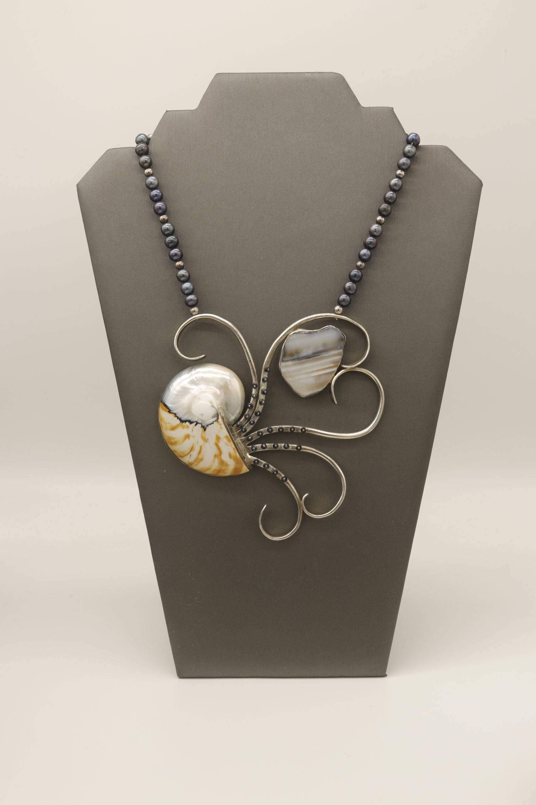 nautilus necklace with black pearls, agate, hermatite and sterling silver