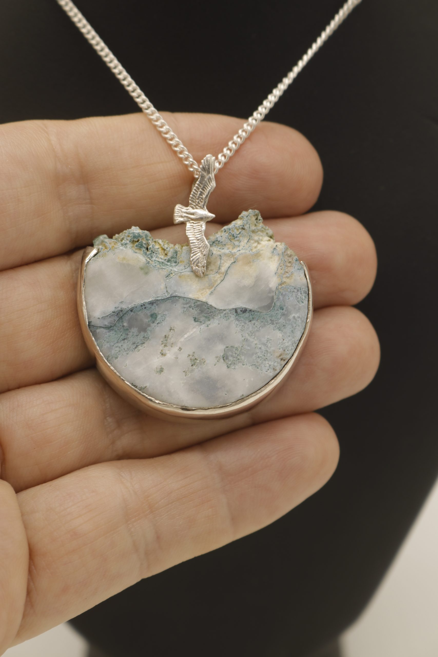 panamite or celadonite pendant with sterling silver bird